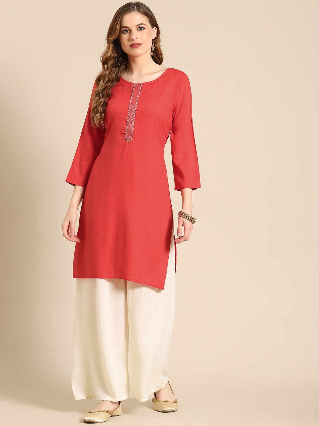 

Prakrti Coral Pink Solid Kurti