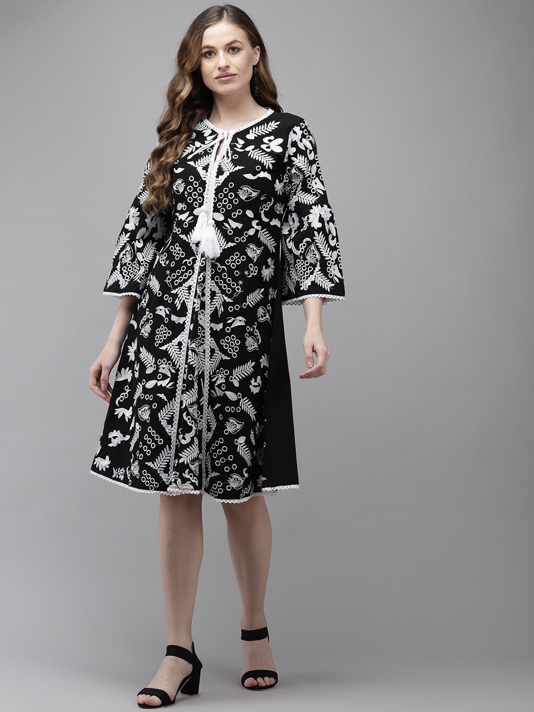 

Ishin Black & White Floral Embroidered Tie-Up Neck A-Line Dress