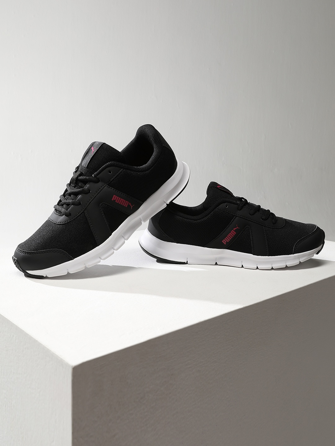 

Puma Women Black Sneakers