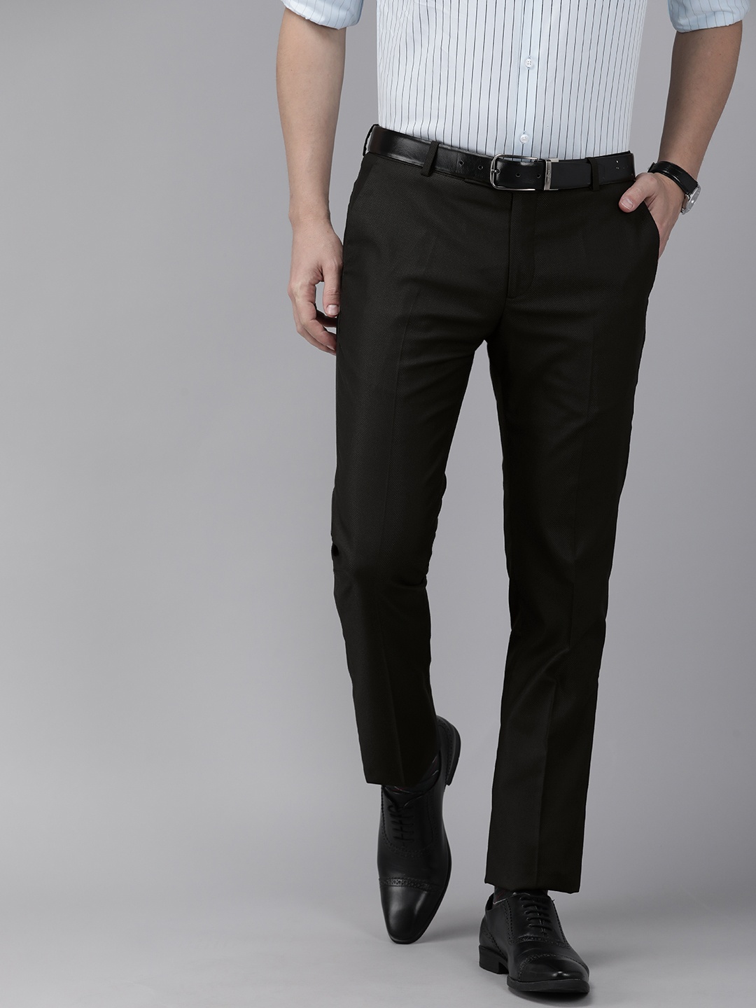 

Arrow Men Black Solid Tapered Fit Formal Trousers