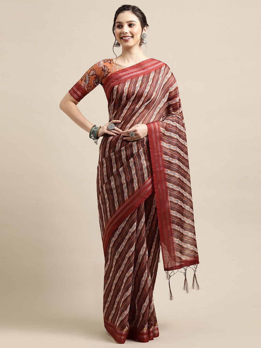 

Saree mall Maroon & Beige Ethnic Motifs Zari Linen Blend Sarees