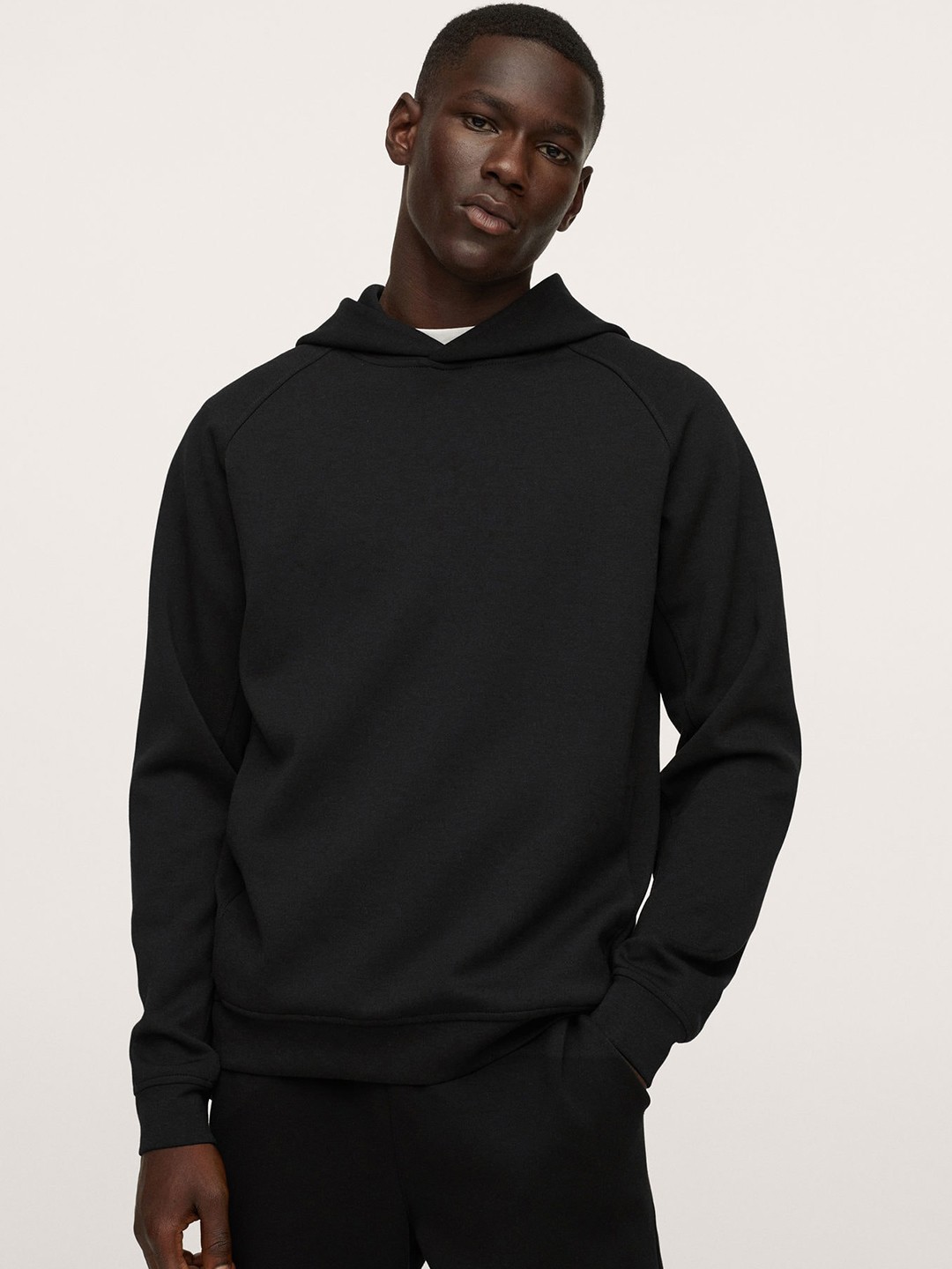 

MANGO MAN Men Black Solid Hooded Sweatshirt
