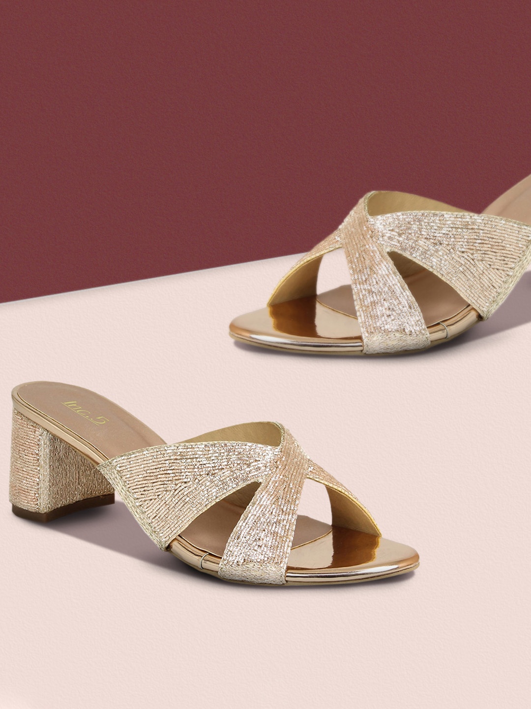 

Inc 5 Rose Gold Block Mules