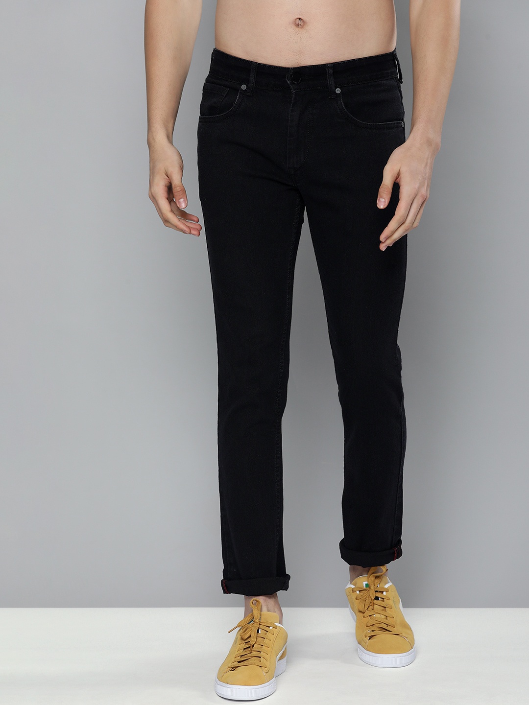 

HERE&NOW Men Black Solid Stretchable Mid Rise Casual Jeans