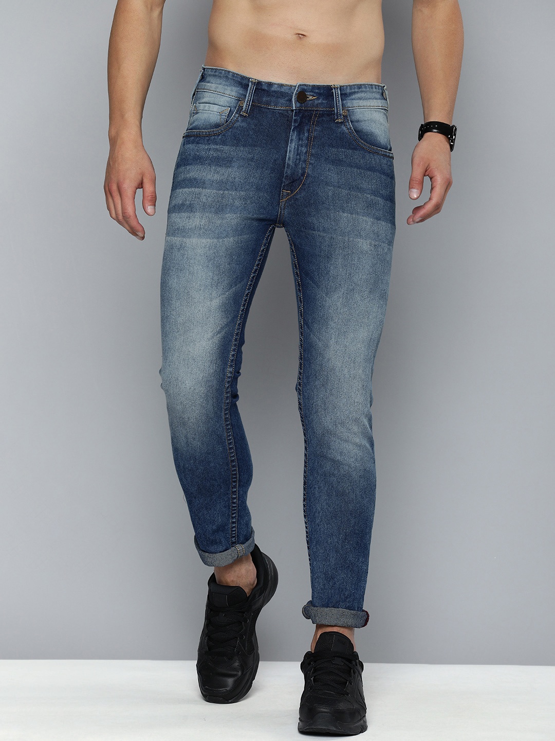 

HERE&NOW Men Blue Slim Fit Heavy Fade Mid-Rise Stretchable Jeans