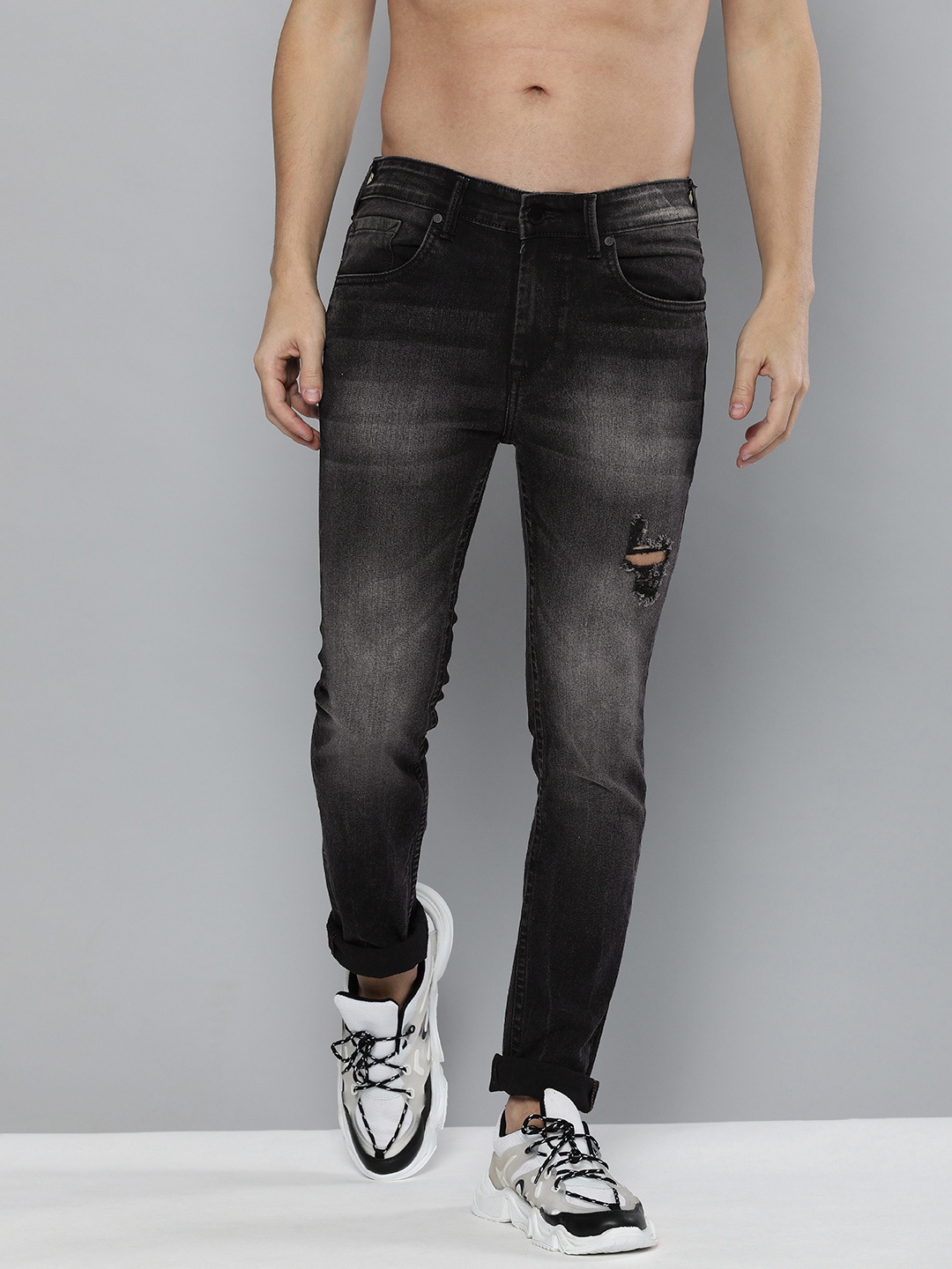 

HERE&NOW Men Black Skinny Fit Mildly Distressed Mid Rise Light Fade Jeans