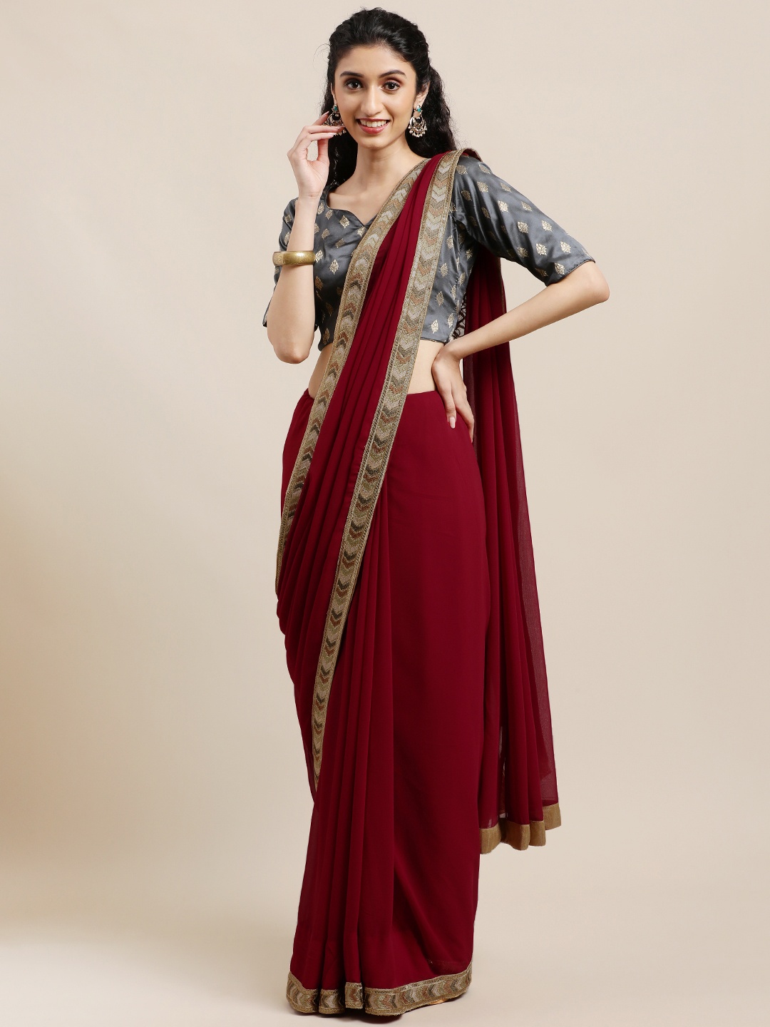 

Ethnovog Maroon Solid Georgette Saree