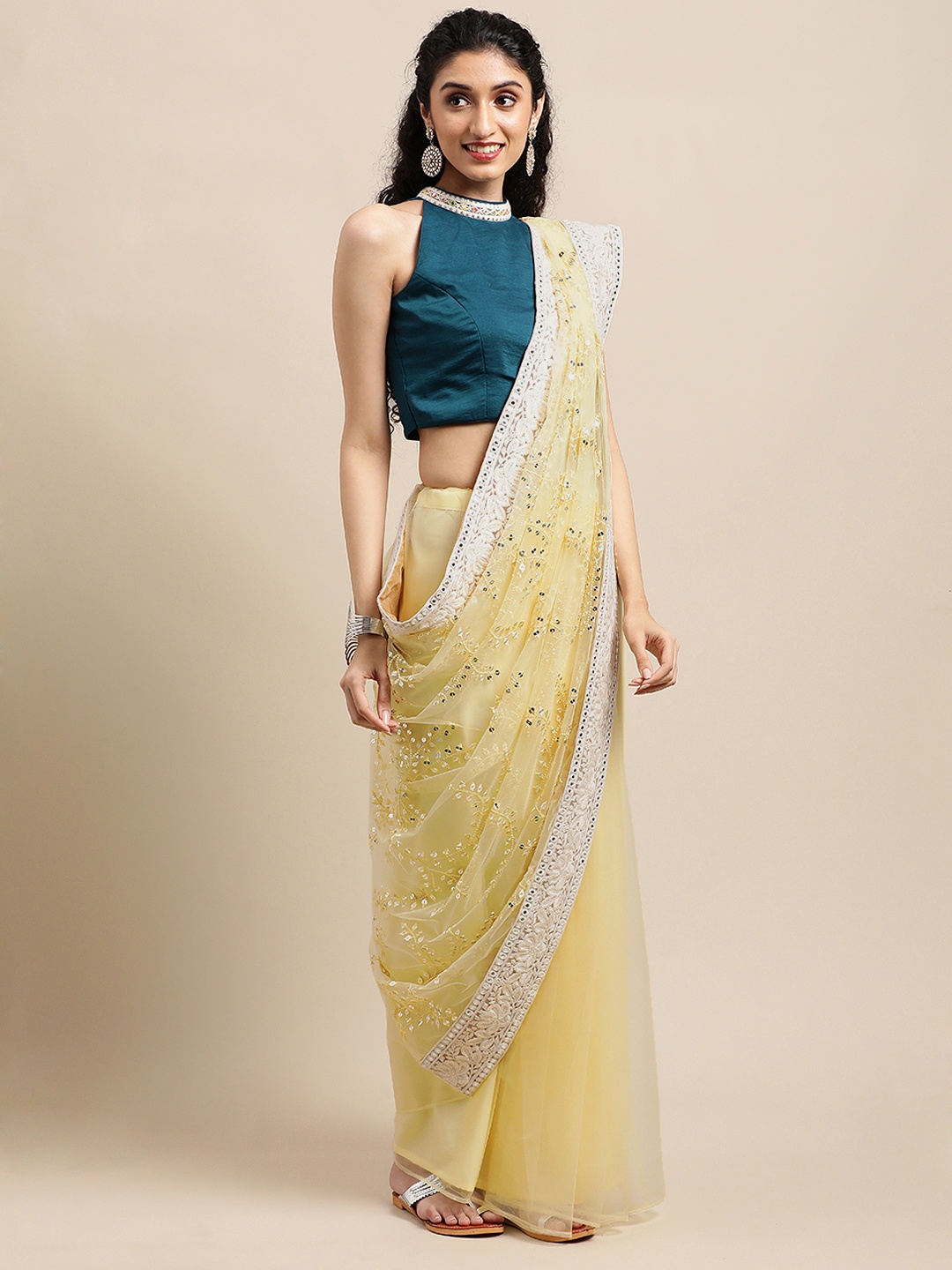 

Ethnovog Yellow Sequinned Net Saree