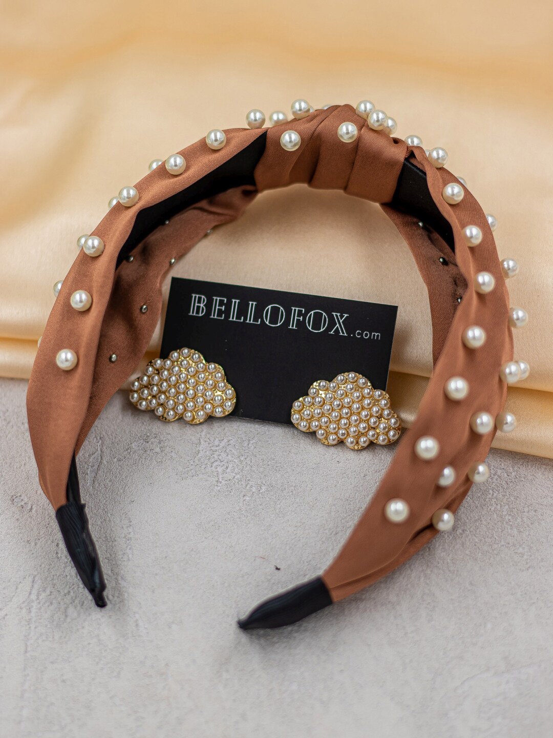 

Bellofox Women Brown & White Embellished Hairband & Earrings Combo