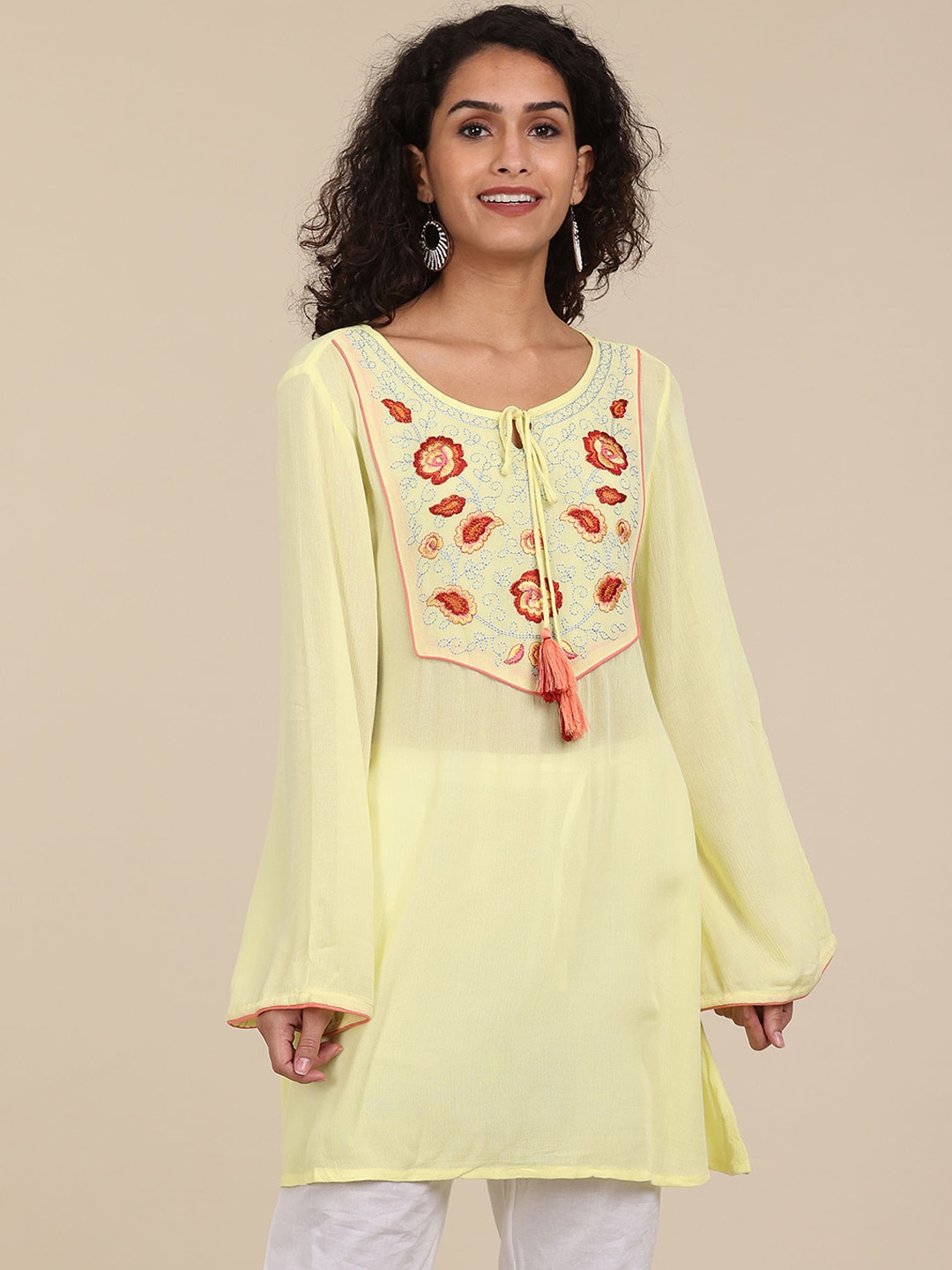

Karigari Women Yellow & Rust Floral Embroidered Bell Sleeves Kurta