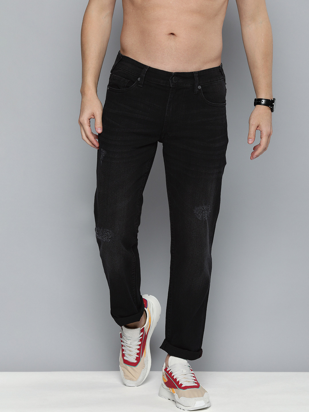 

HERE&NOW Men Black Slim Fit Low Distressed Mid-Rise Stretchable Jeans