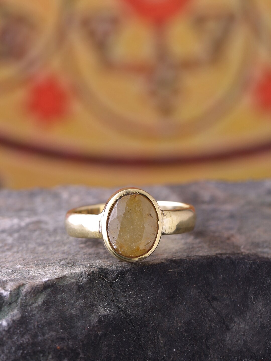 

Dare by Voylla Men Gold-Toned Yellow Sapphire Garnet Stone-Studded Ashtadhatu Antique Finger Ring