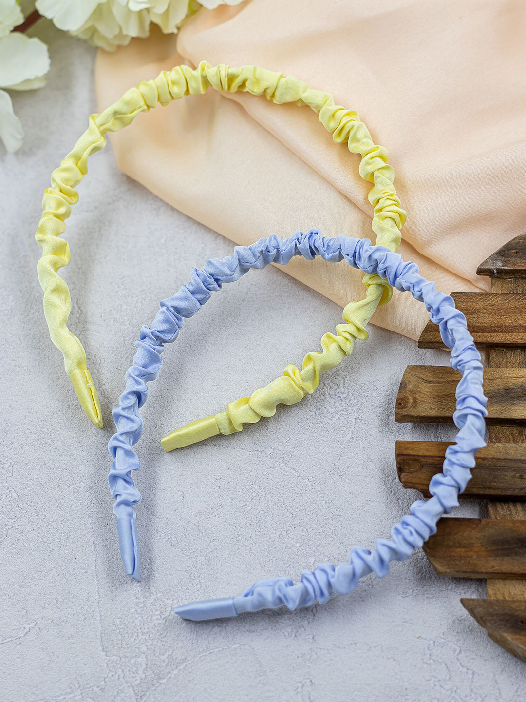 

Bellofox Women Pack Of 2 Blue & Yellow Solid Hairbands