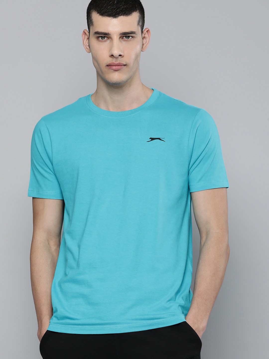 

Slazenger Men Blue Solid Round-Neck Pure Cotton Bio-Wash T-shirt With Small Logo Print