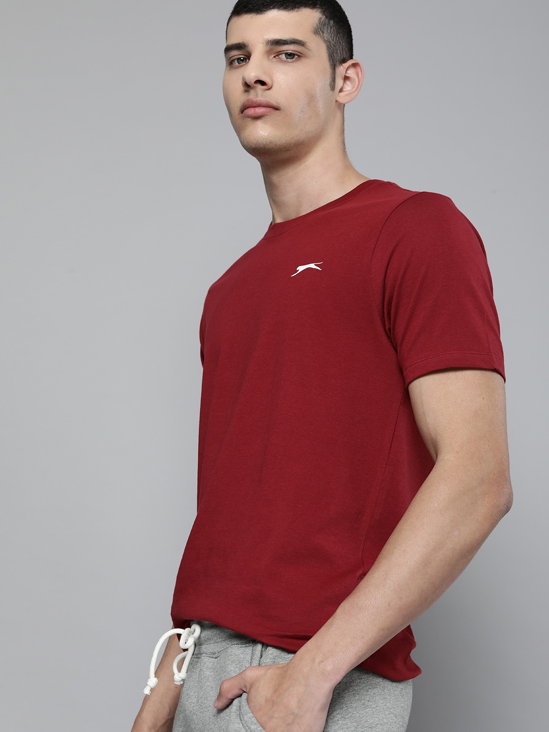 

Slazenger Men Maroon Solid Round-Neck Pure Cotton Bio-Wash T-shirt With Small Logo Print