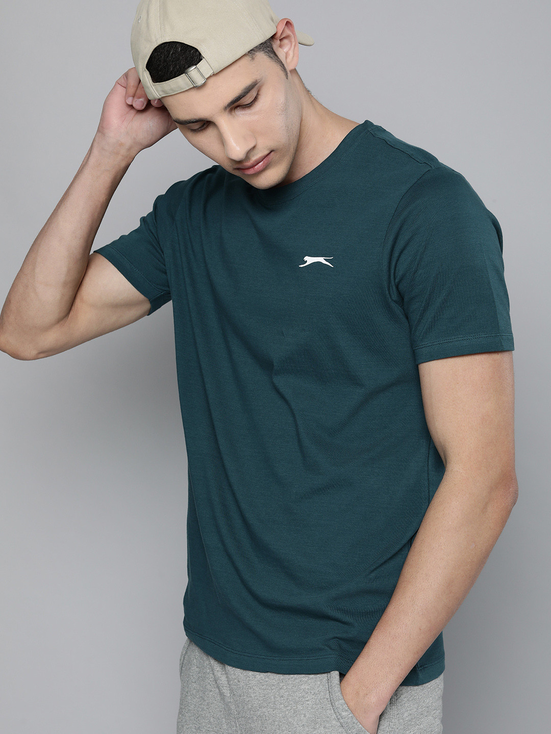 

Slazenger Men Teal Solid Round-Neck Pure Cotton T-shirt With Small Logo Print