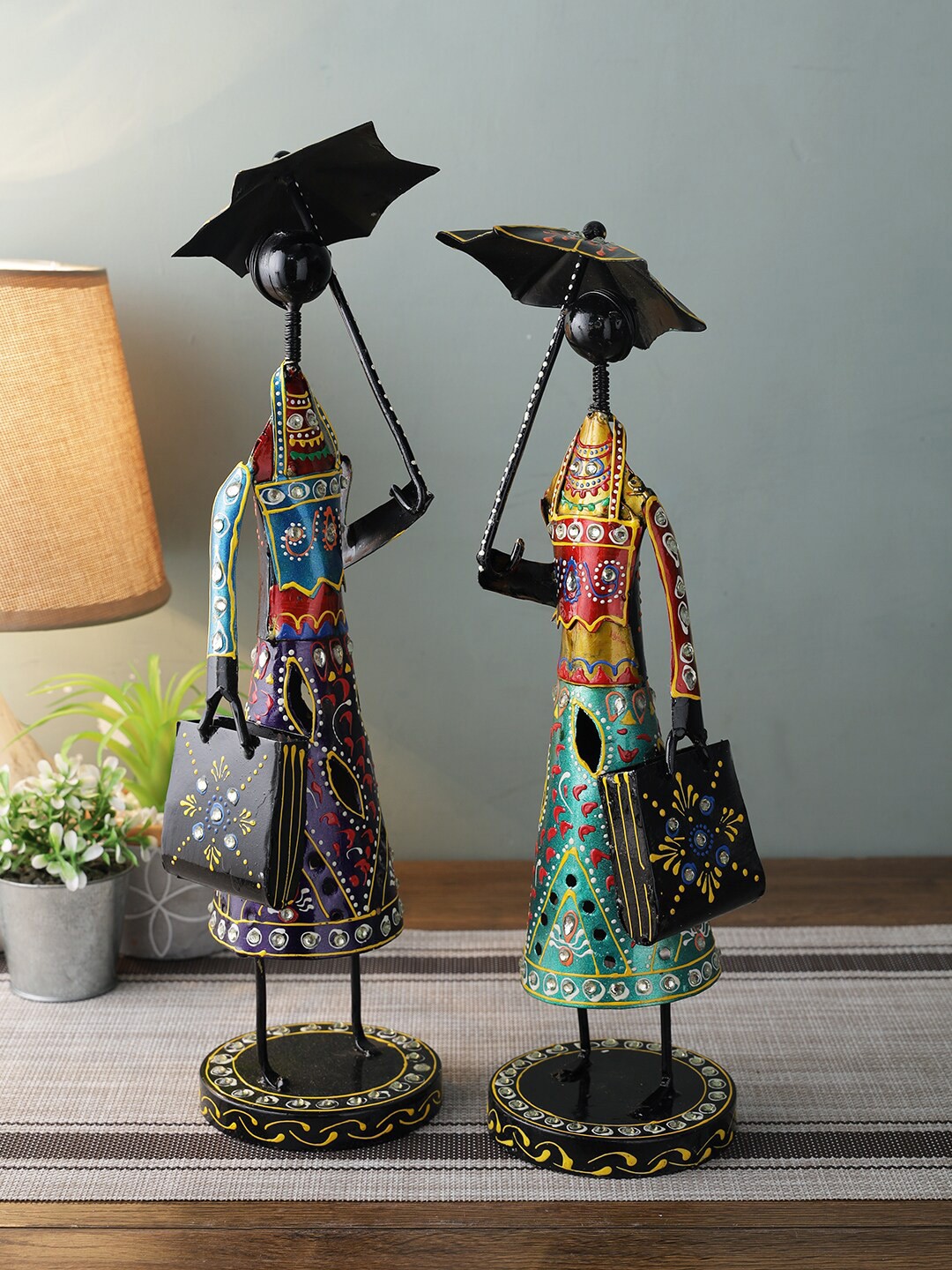 

Aapno Rajasthan Multicoloured Set of 2 Black & Blue Metal Women Figurine Showpieces, Multi