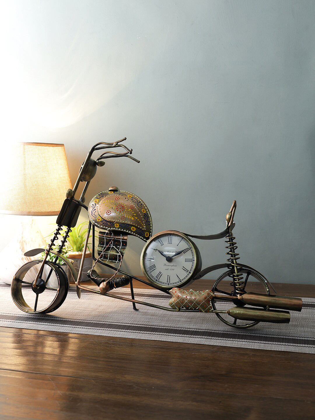 

Aapno Rajasthan Brown Abstract Shaped Vintage Table Clock Showpiece