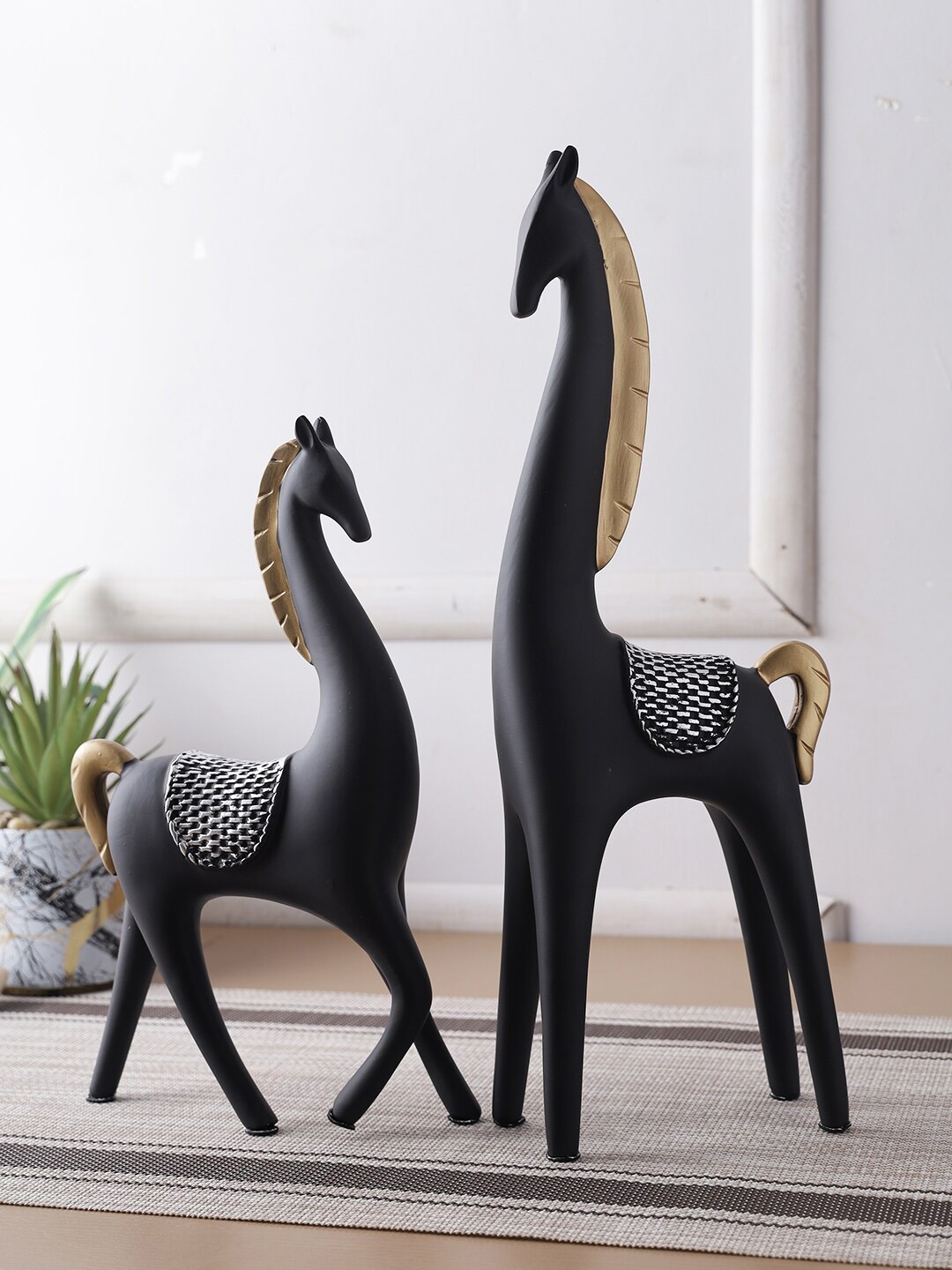 

TAYHAA Set Of 2 Black Handcrafted Poised Reindeers Showpieces