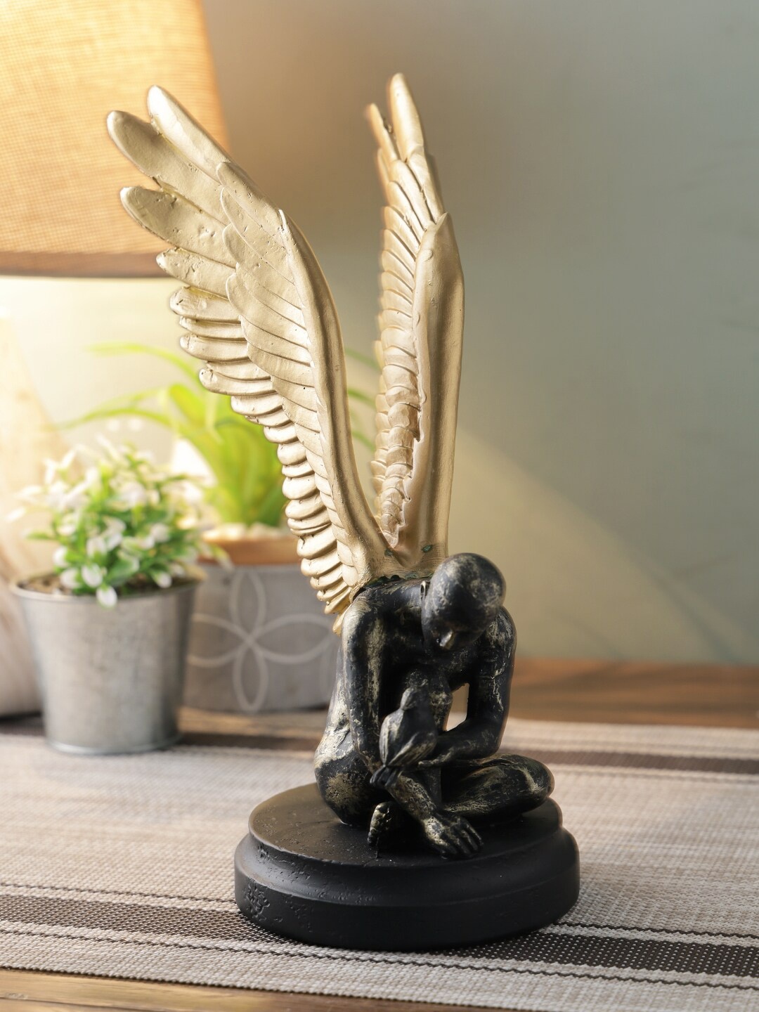 

TAYHAA Black & Gold Handcrafted Winged Figurine Showpiece