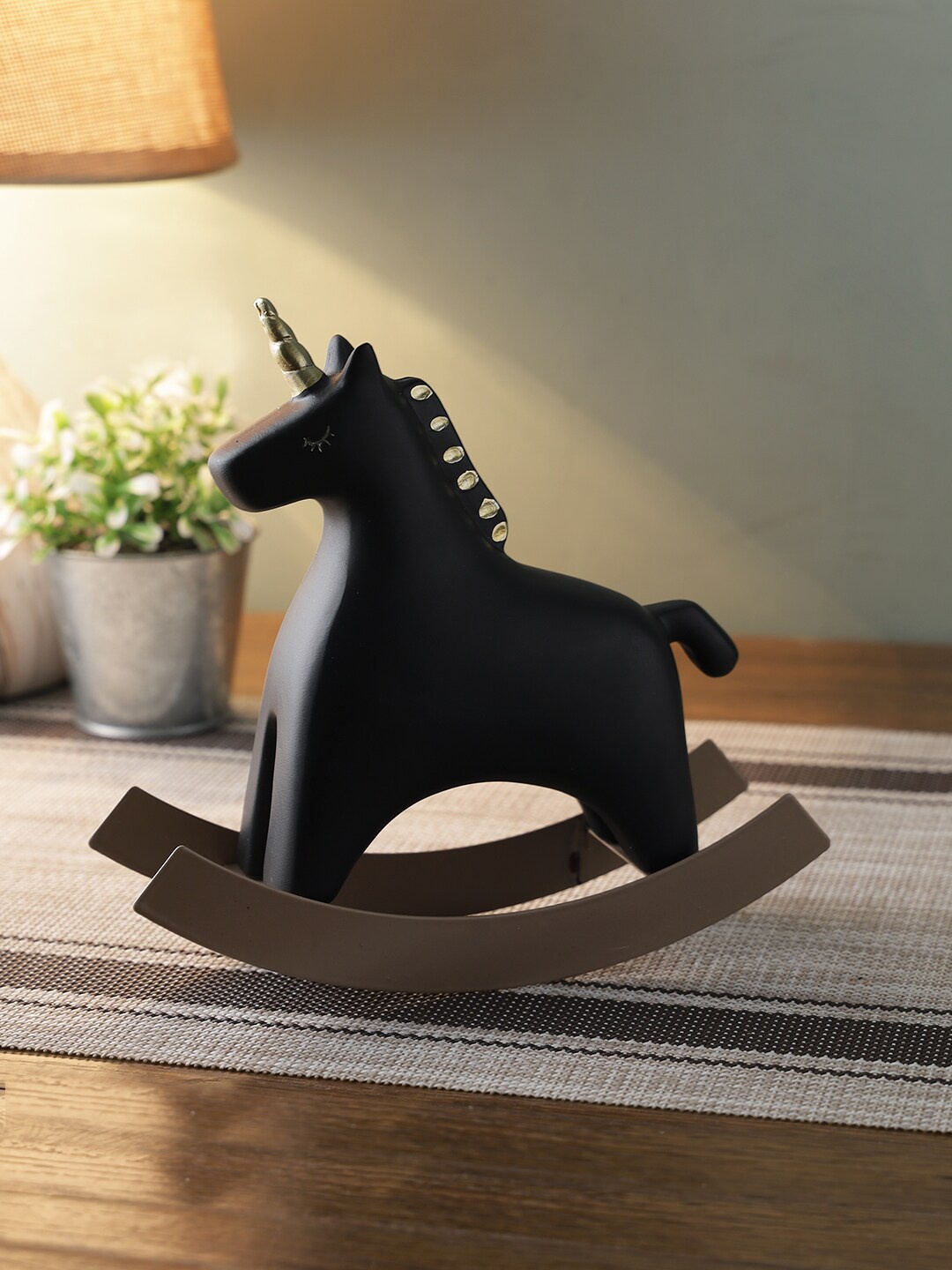 

TAYHAA Black & Brown Unicorn Showpiece