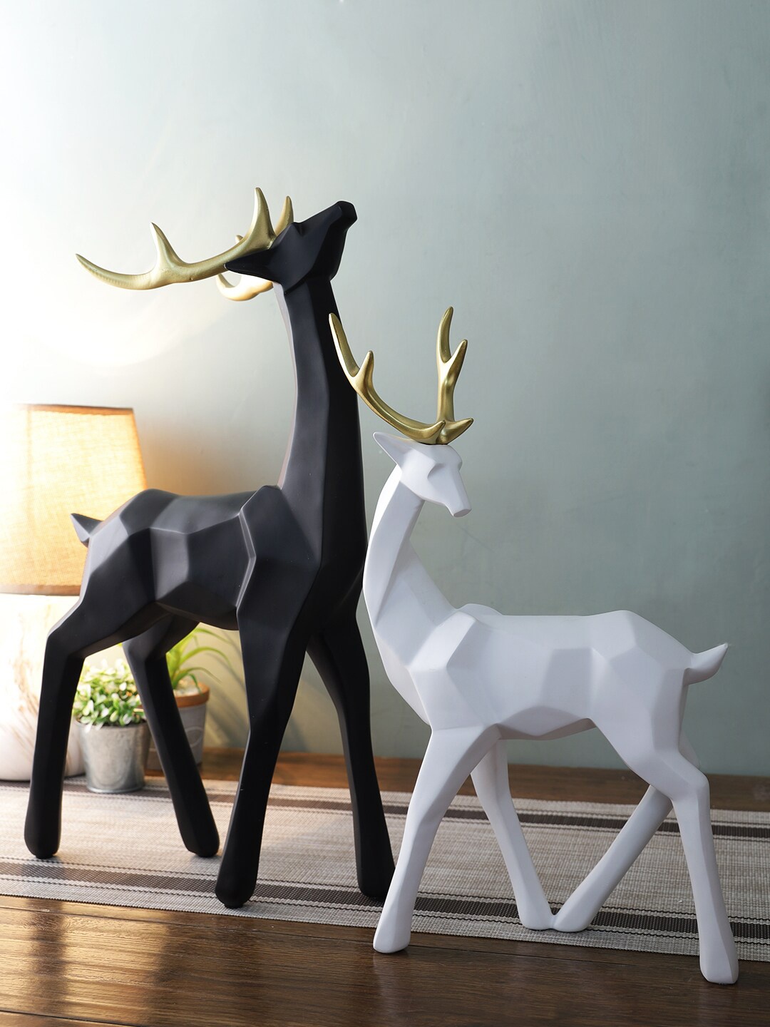 

TAYHAA Set Of 2 Handcrafted Reindeers Figurine Showpiece, Black
