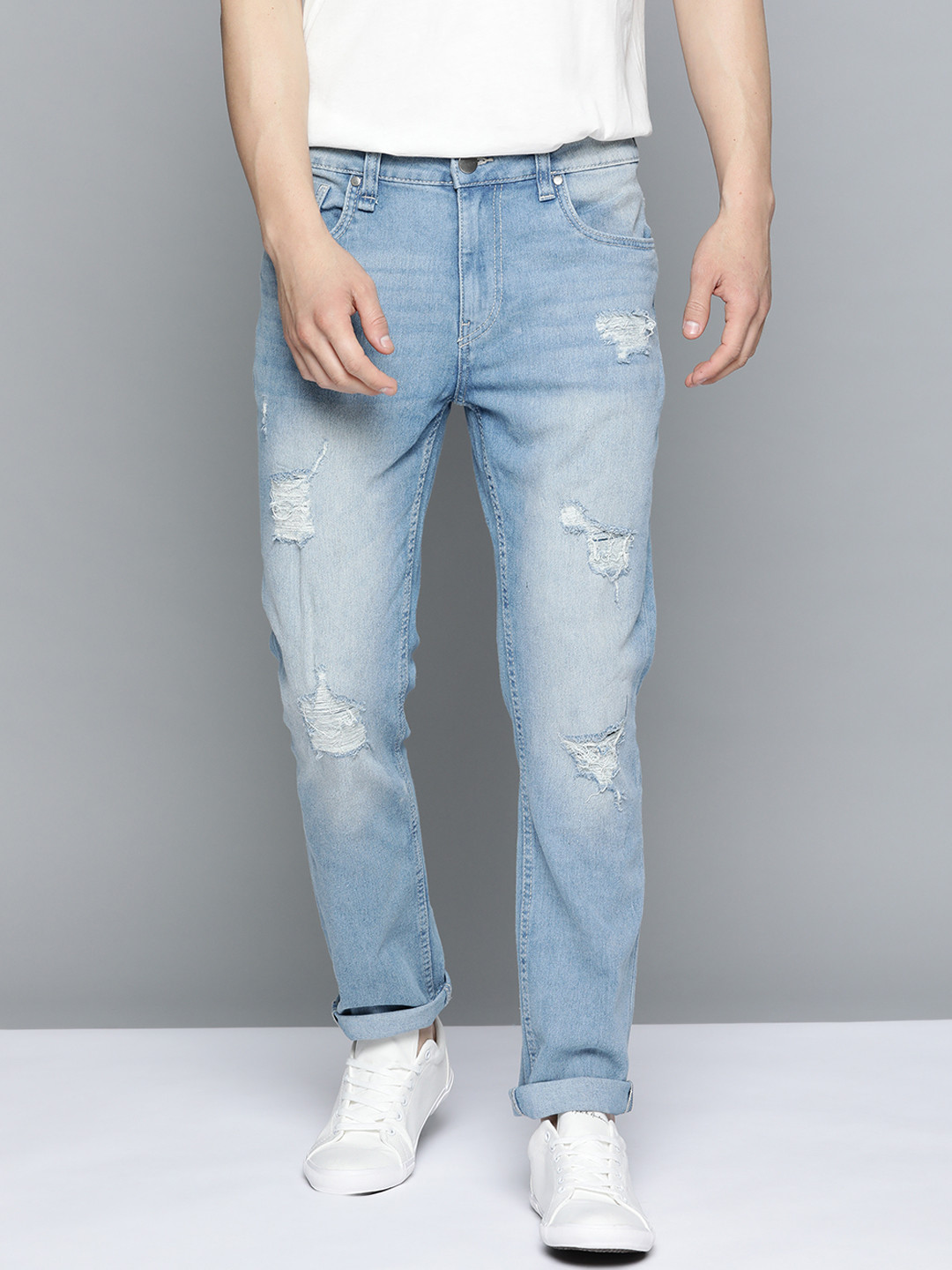 

Mast & Harbour Men Blue Skinny Fit Mildly Distressed Light Fade Stretchable Jeans