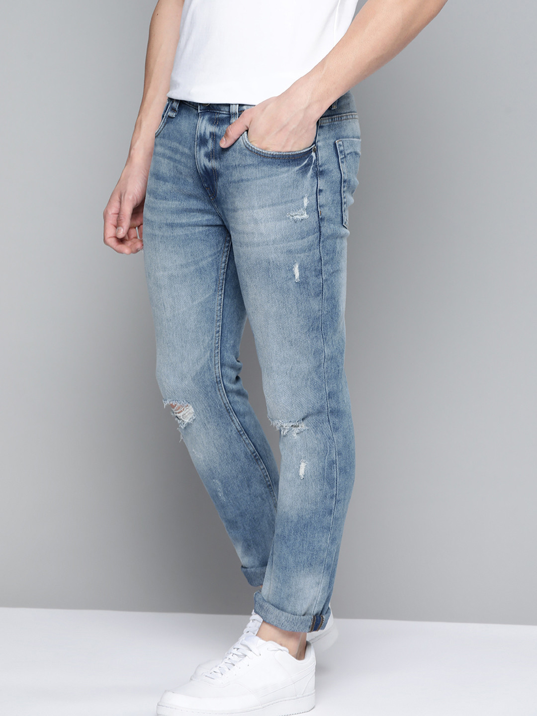 

Mast & Harbour Men Blue Skinny Fit Mildly Distressed Light Fade Stretchable Jeans