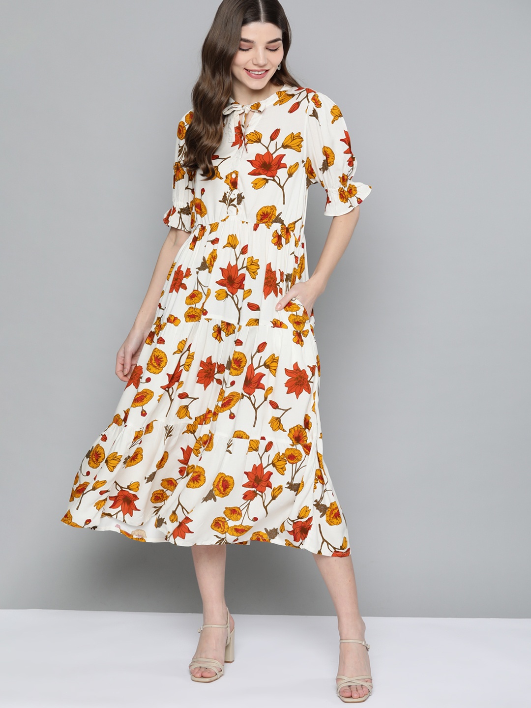 

Mast & Harbour Women Off White & Mustard Yellow Floral Tie-Up Neck A-Line Midi Dress