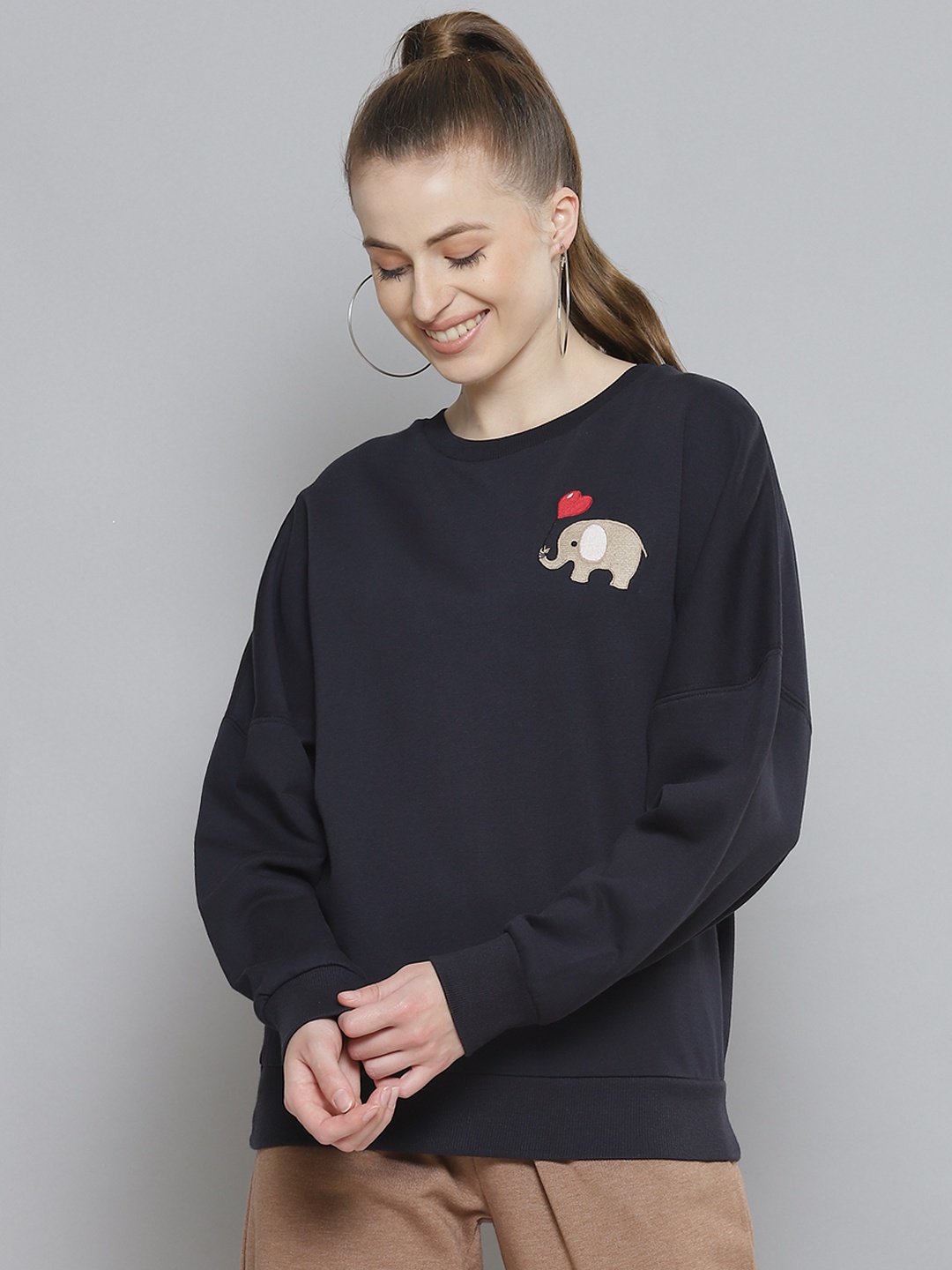 

Femella Women Navy Blue Fleece Sweatshirt