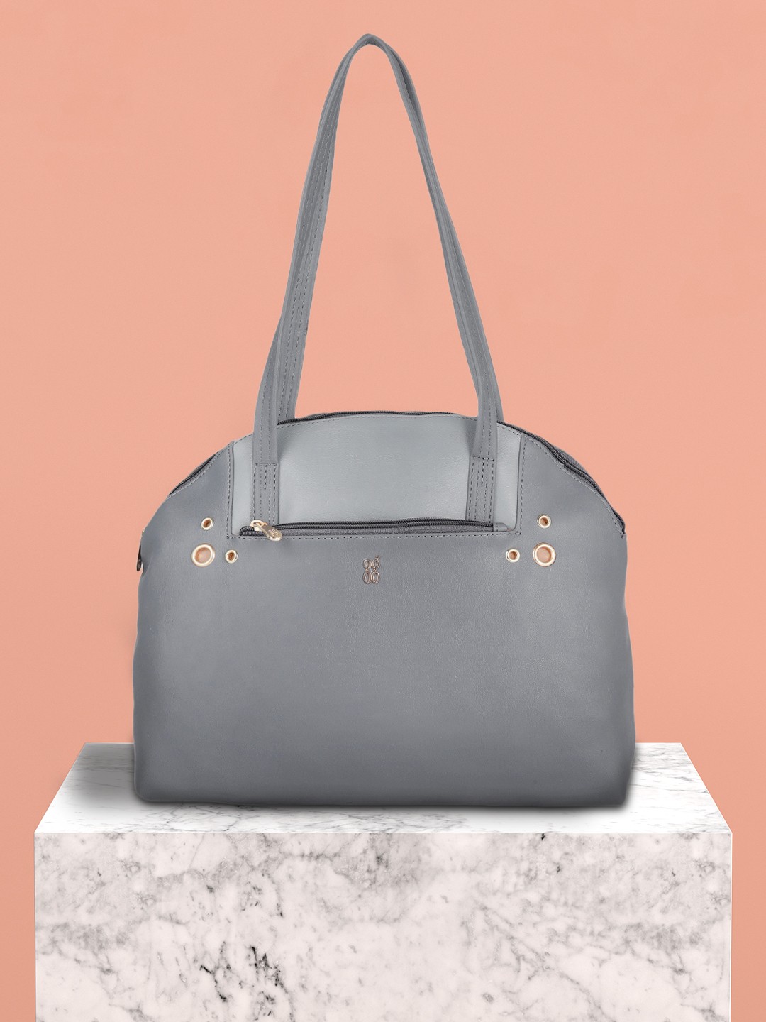 

Baggit Blue Solid Synthetic Regular Structured Shoulder Bag with Cut Work