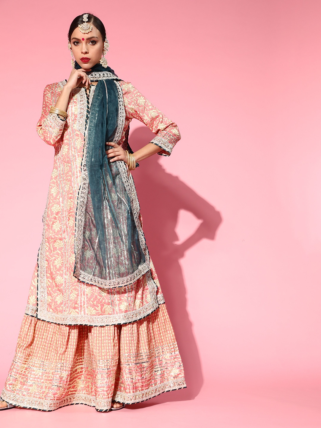 

Ishin Women Peach-Coloured Floral Embroidered Regular Gotta Patti Kurta with Sharara & With Dupatta