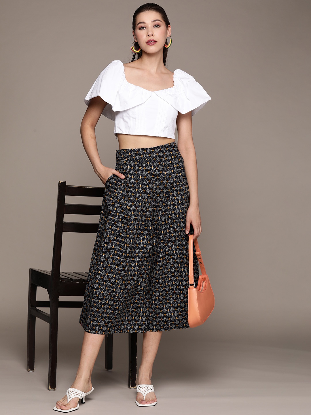 

aarke Ritu Kumar Women Blue Checked Knitted Cropped Palazzos