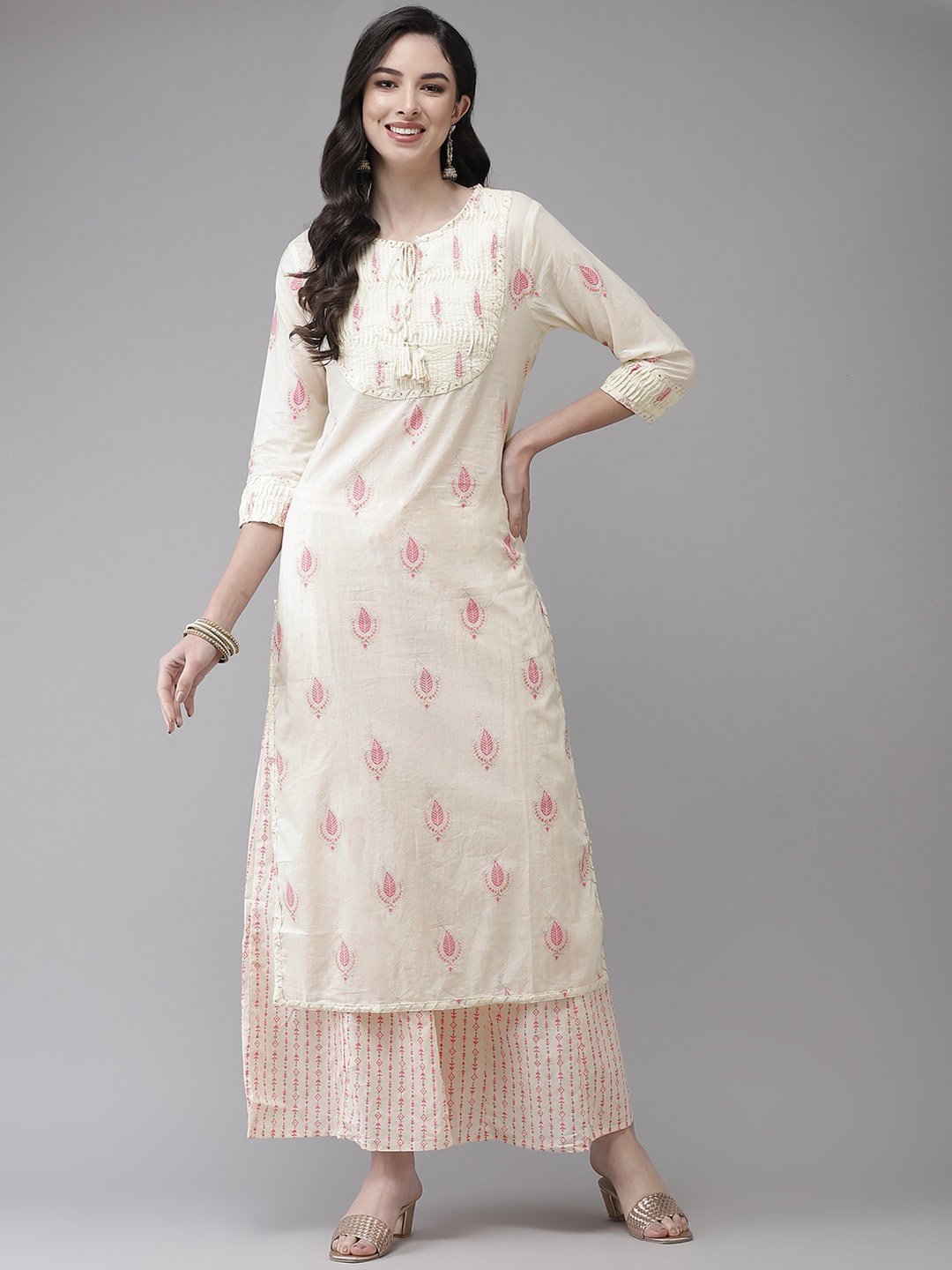 

Ishin Women Cream-Coloured Ethnic Motifs Embroidered Regular Gotta Patti Kurta with Sharara