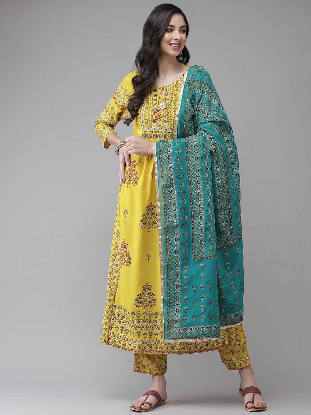 

Ishin Women Yellow Ethnic Motifs Embroidered Empire Beads and Stones Kurta with Trousers & With Dupatta