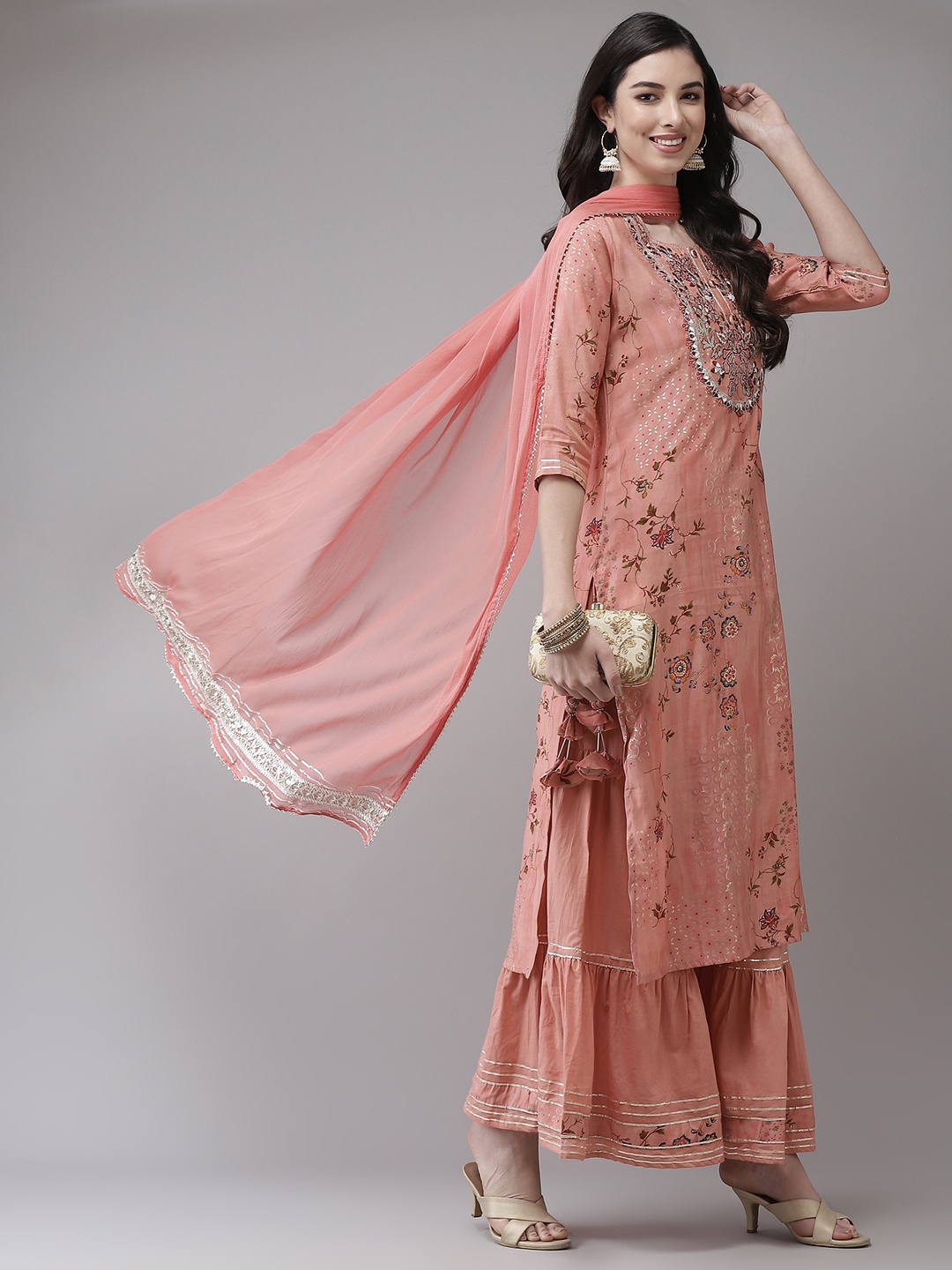 

Ishin Women Peach-Coloured Floral Embroidered Regular Kurta with Sharara & With Dupatta