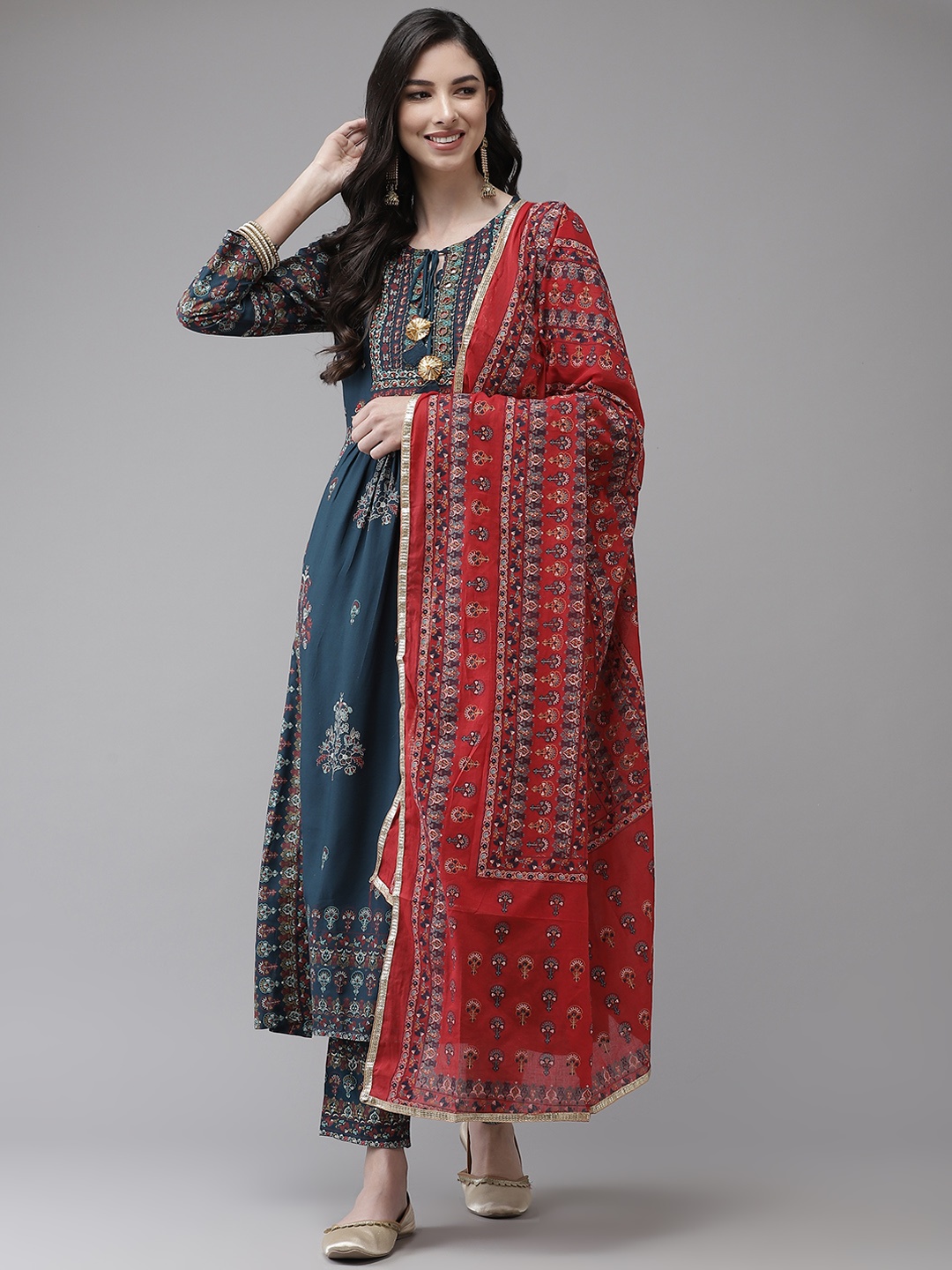 

Ishin Women Teal Blue Printed Regular Beads and Stones Kurta with Trousers & With Dupatta