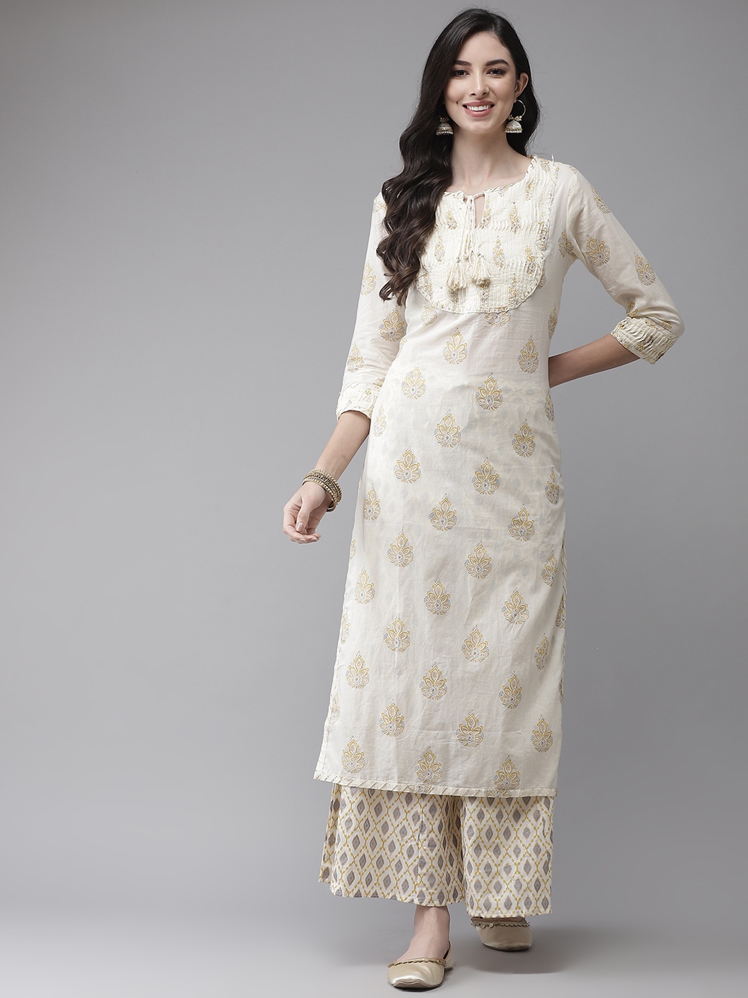 

Ishin Women Cream-Coloured Printed Regular Kurta with Palazzos