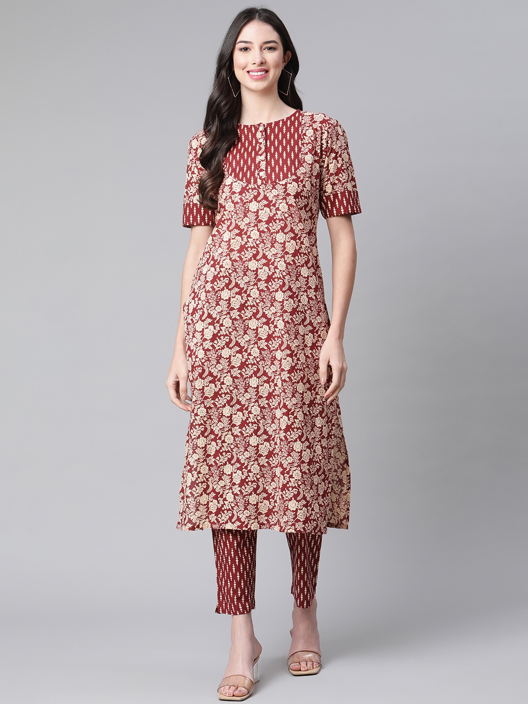 

Indibelle Women Maroon & Golden Pure Cotton Ethnic Motifs Printed Straight Kurta