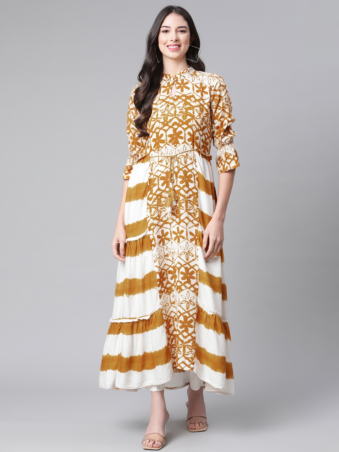 

Indibelle Women Mustard Yellow & White Ethnic Motifs Print & Dyed Layered A-Line Kurta