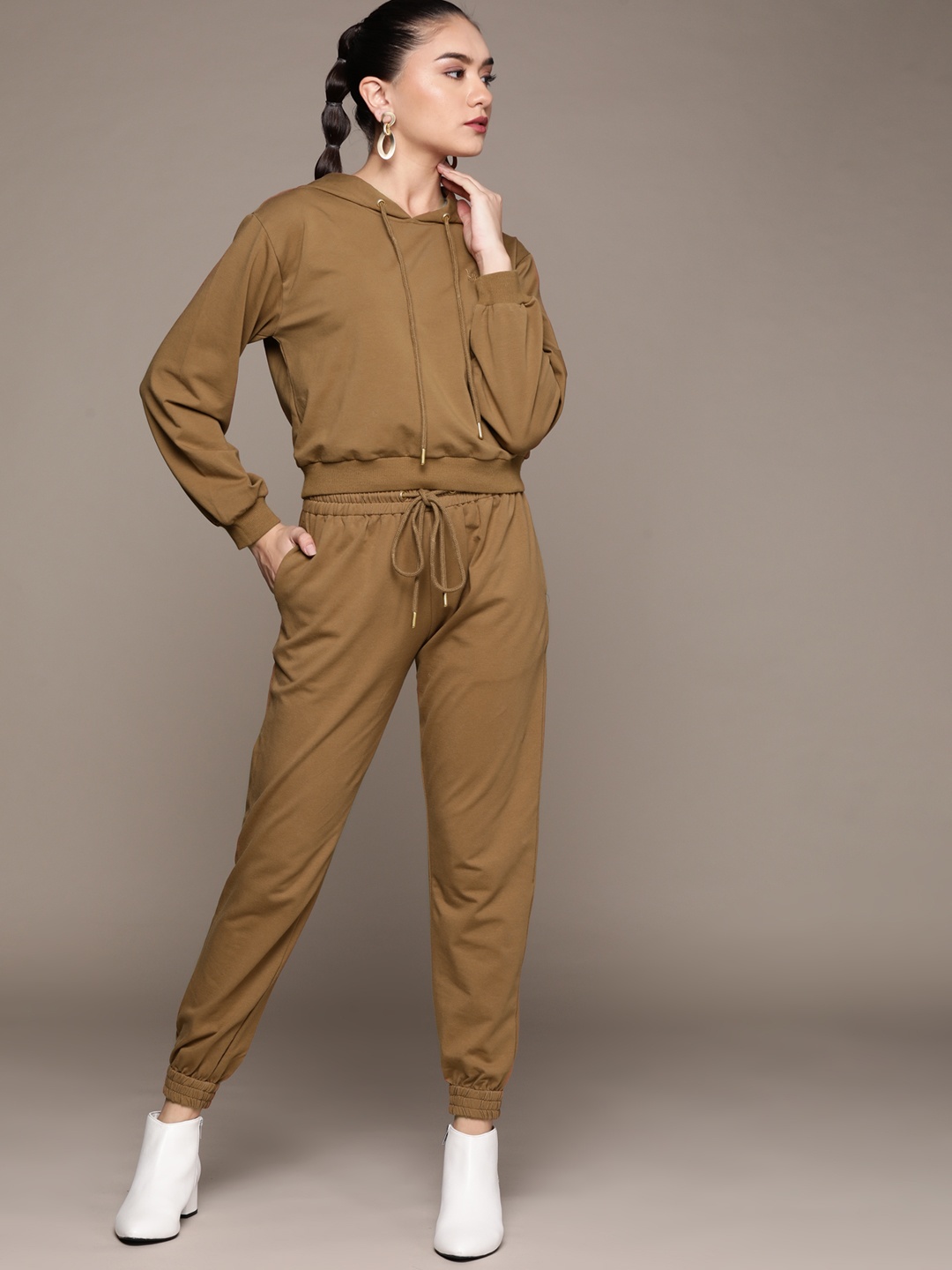 

aarke Ritu Kumar Women Brown Solid Track Suit