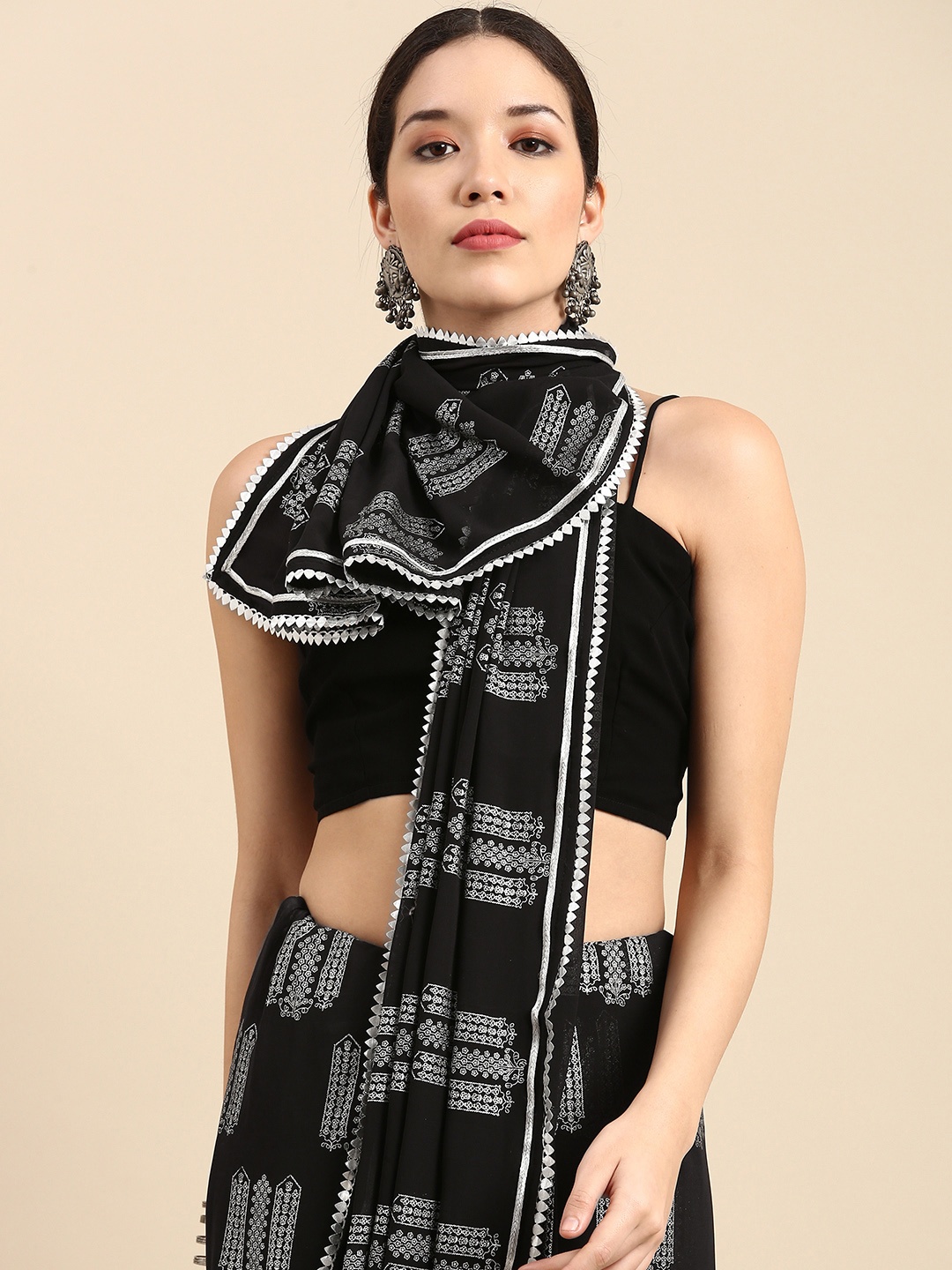 

Sangria Black & Silver-Toned Ethnic Motifs Gotta Patti Saree