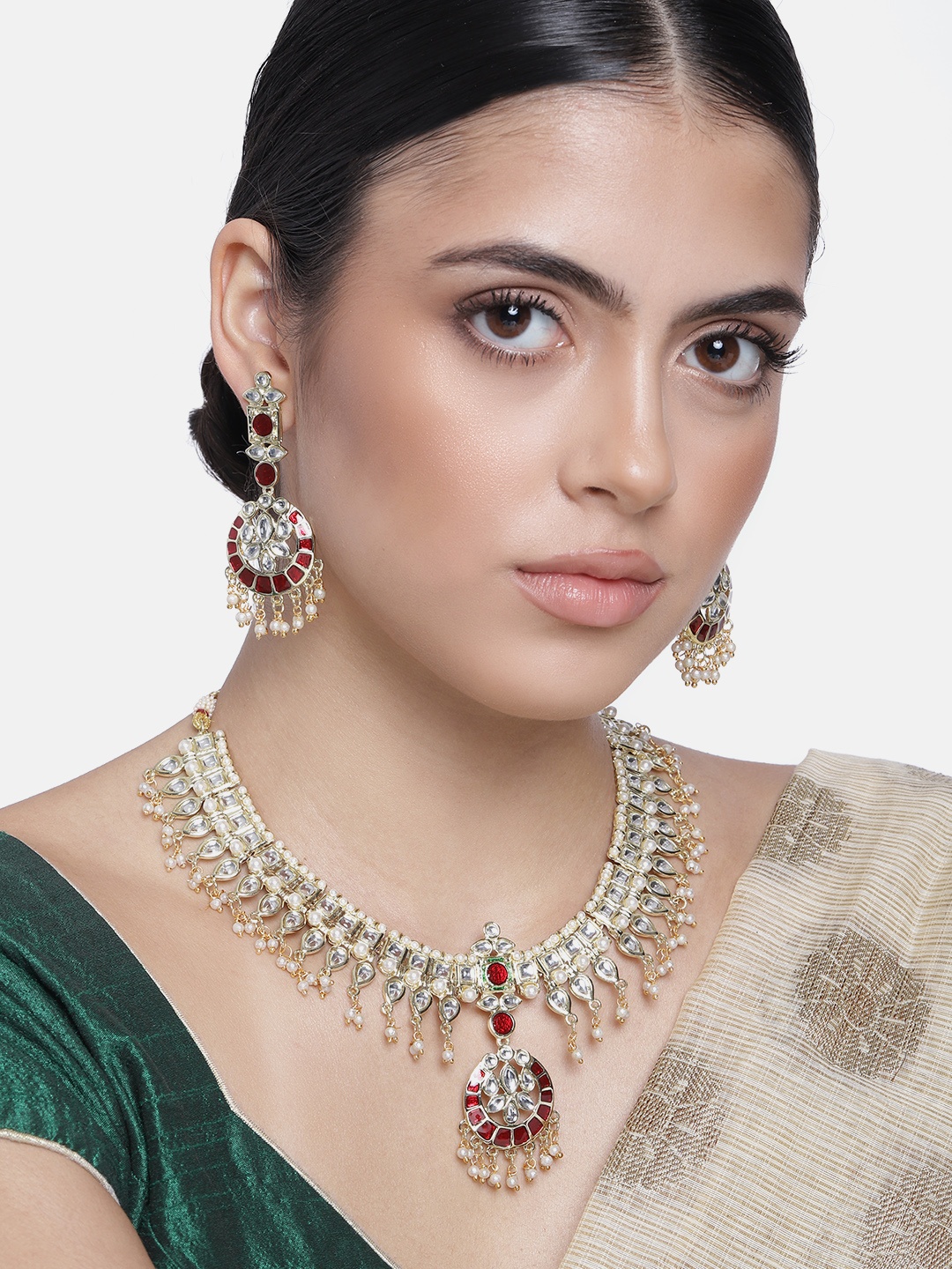 

Estele Gold Plated Resplendent Kundan Jewellery Set with Pearl & Enamel for Women, White