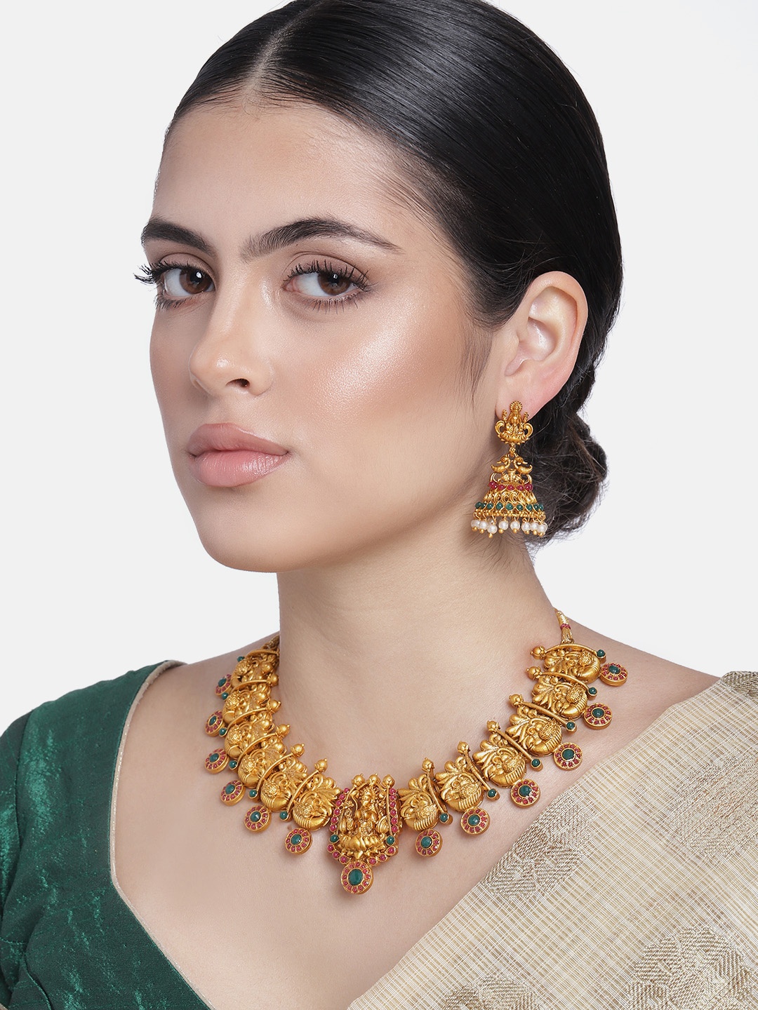

Estele Gold Plated Lakshmi Ji Matt Finish Temple Necklace Set With Crystals and Pearls