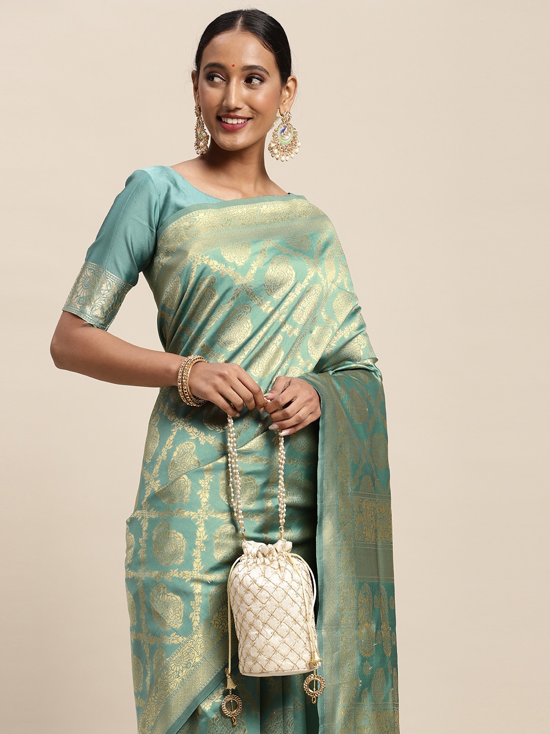 

Saree mall Sea Green Ethnic Motifs Silk Blend Banarasi Sarees