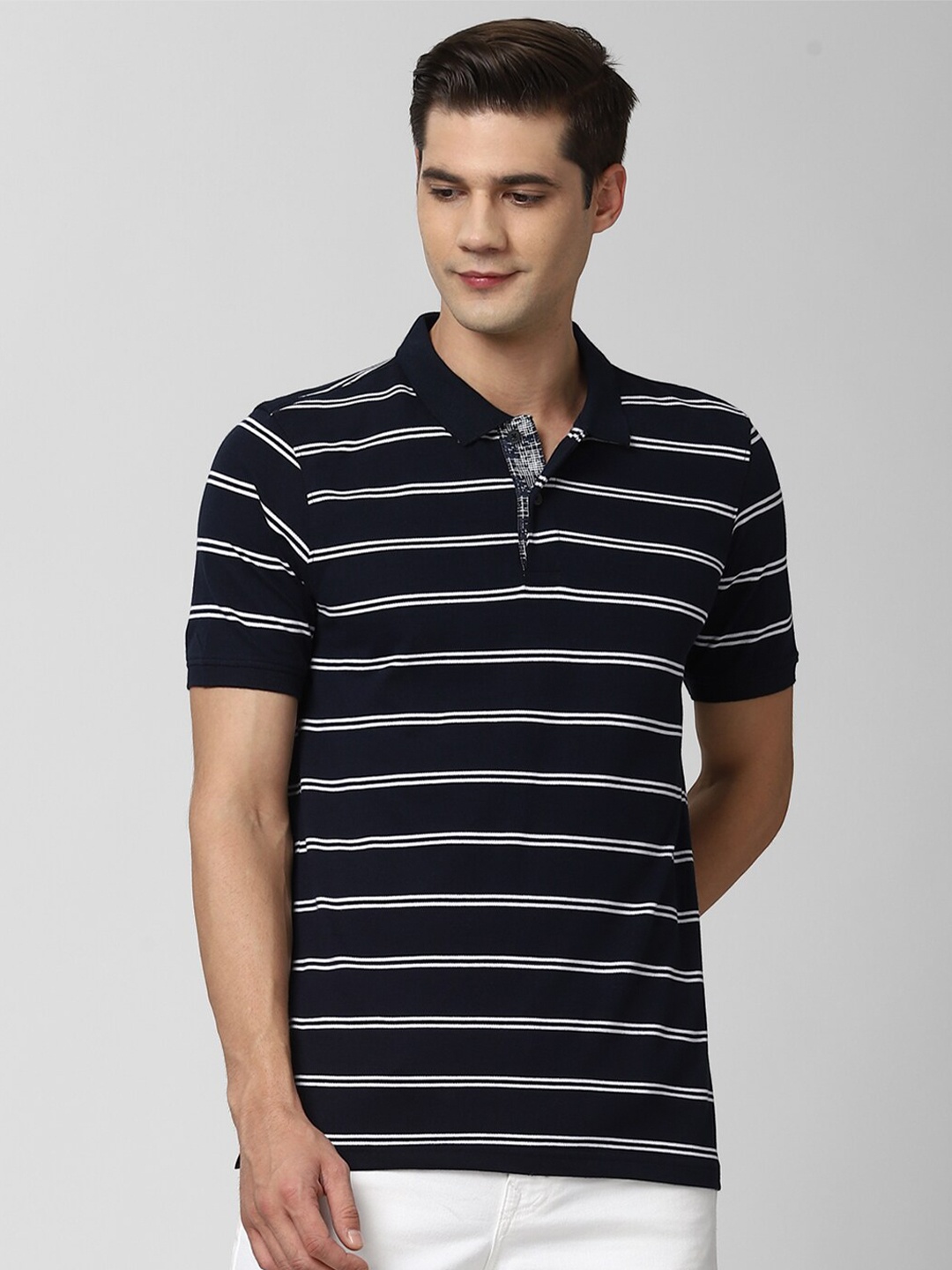 

Peter England Casuals Men Navy Blue Striped Polo Collar T-shirt