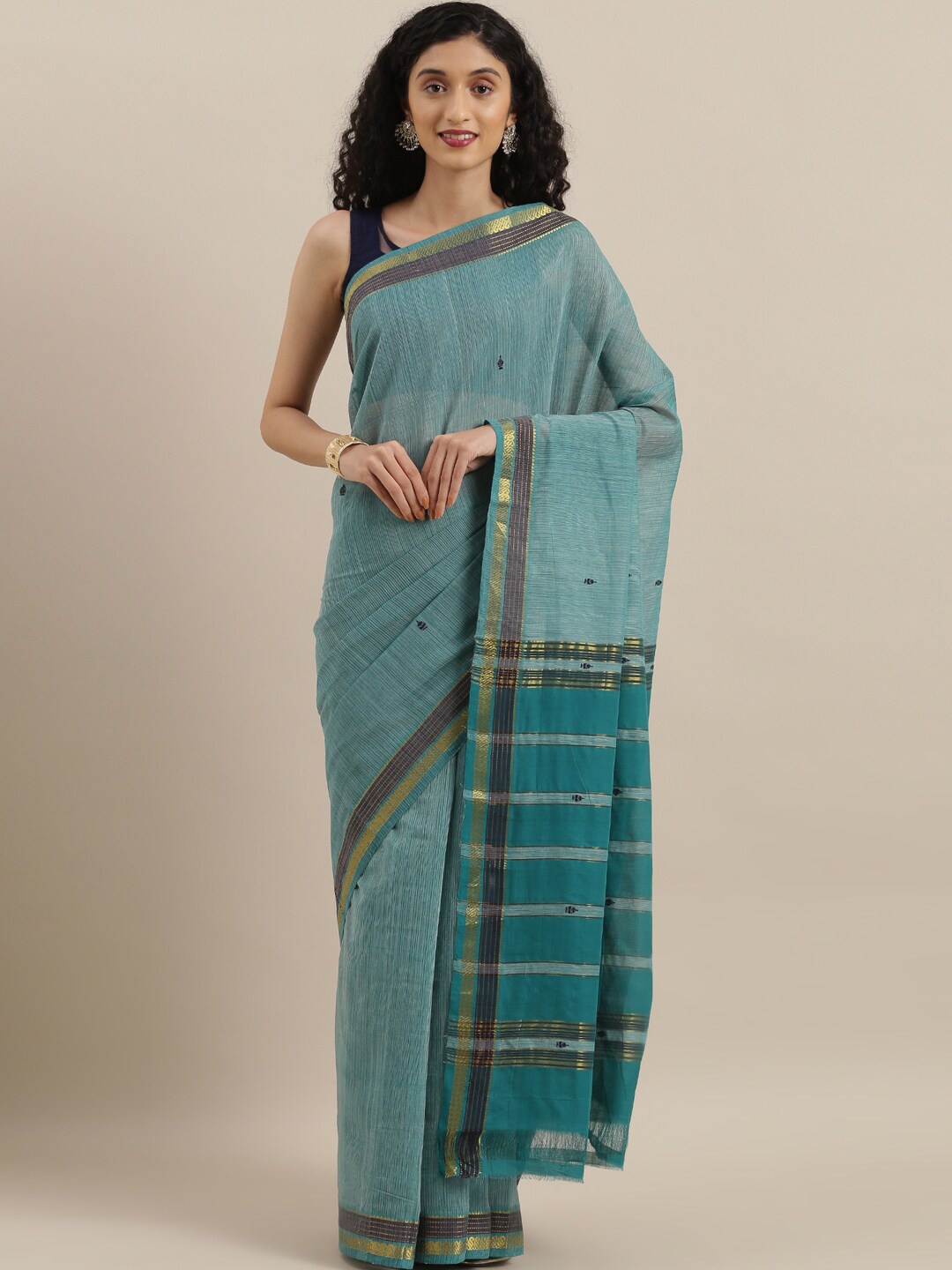 

The Chennai Silks Teal & Gold-Toned Woven Design Zari Pure Cotton Saree
