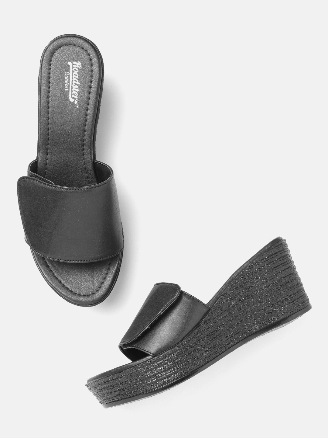 

The Roadster Lifestyle Co Women Black Solid Wedge Heels