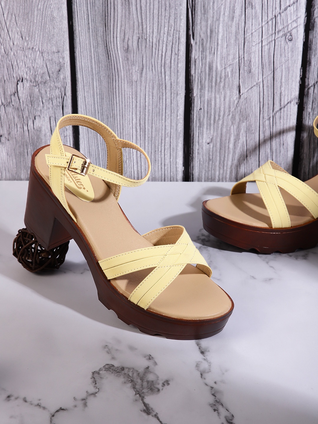 

Roadster Women Yellow Solid Striped Block Heels