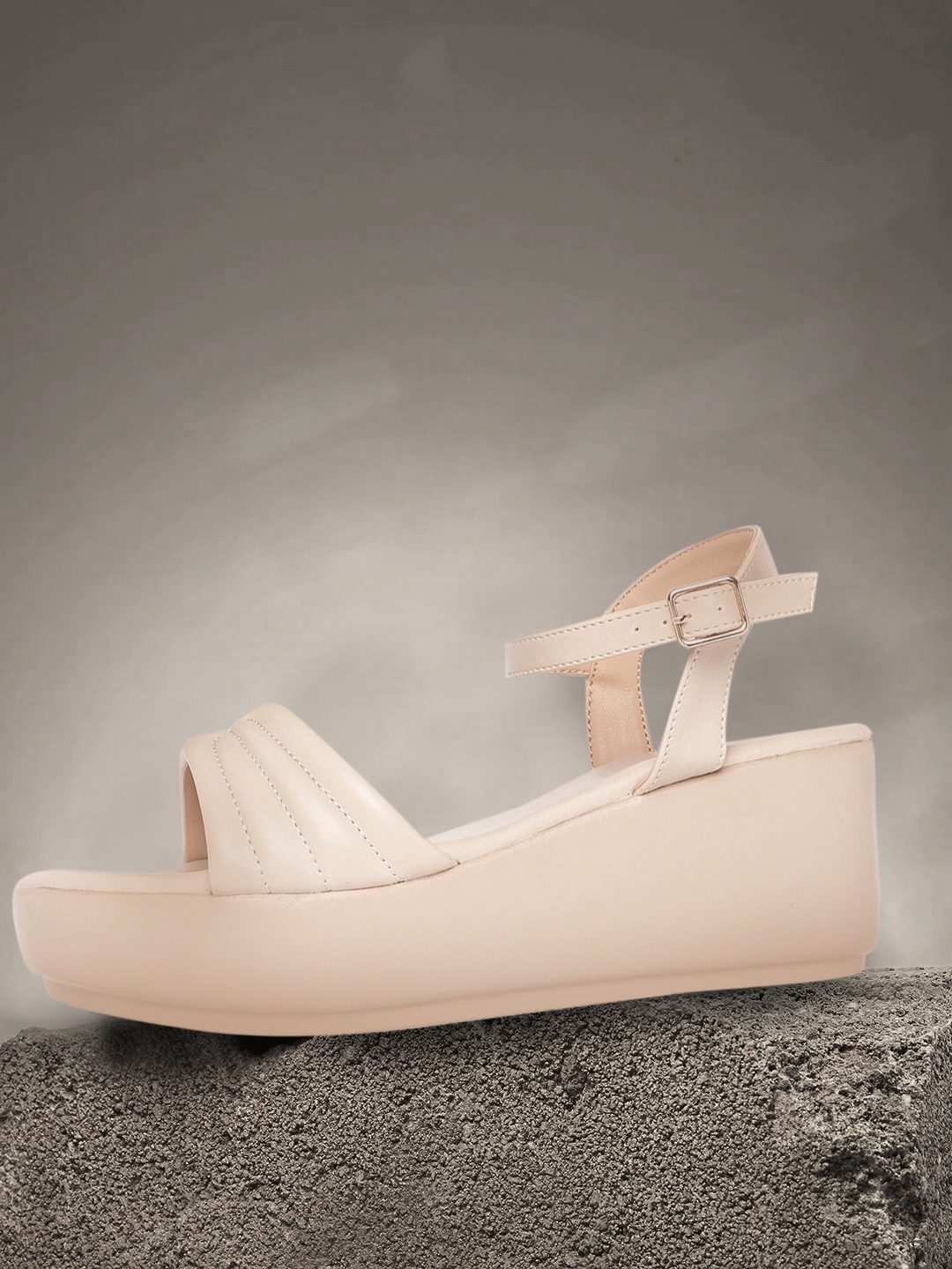 

Roadster Women Beige Solid Wedge Heels